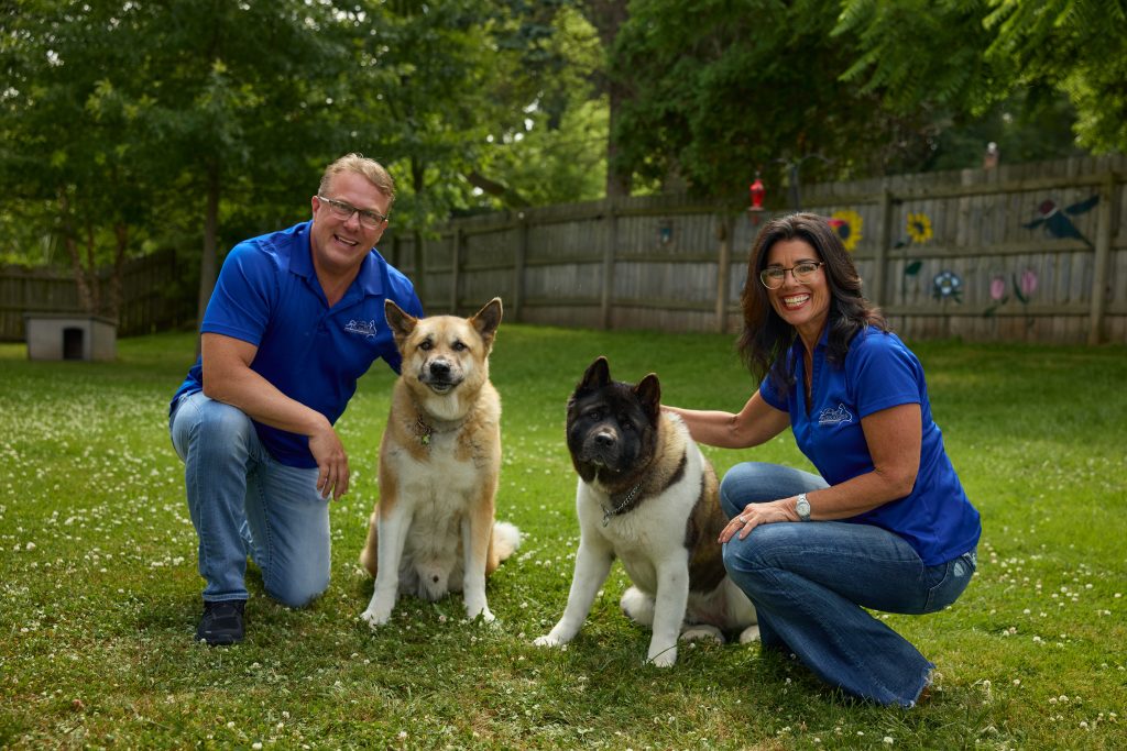 Mike and Andrea Harris with dogs Marco and Macee